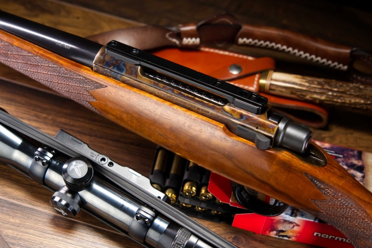 The rifle with Contessa rail mounted on the receiver and the scope on its quick detach mount