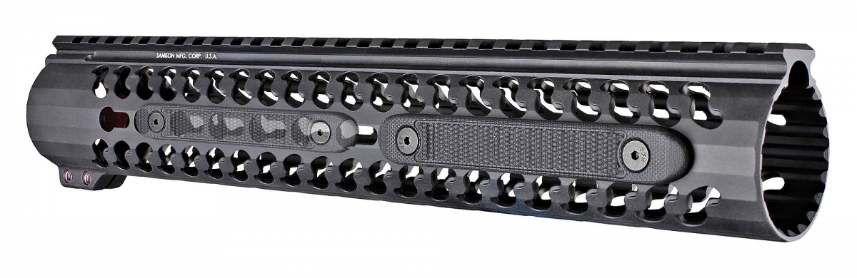 The new Hogue G10 KeyMod rail covers mounted, with another one (ghosted) at left