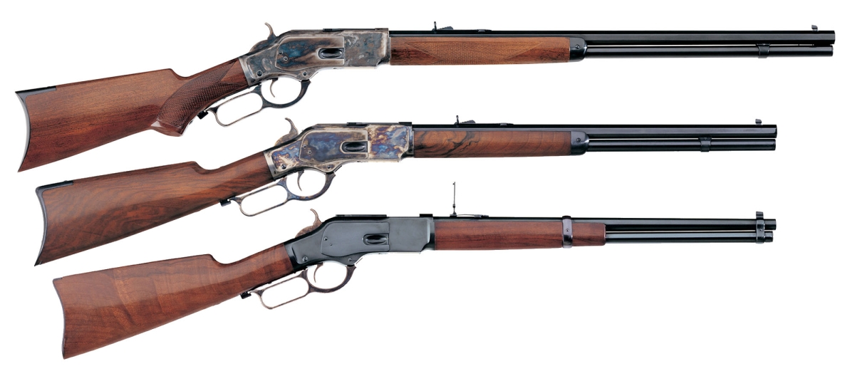 Modern Uberti replicas of the Winchester 1873 lever action rifle and carbine.