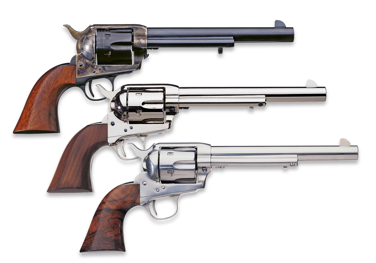 Three Uberti faithful replicas of the Colt 1873 Single Action Army with 7.5" barrel, with standard blued, nickel and steel finishes.
