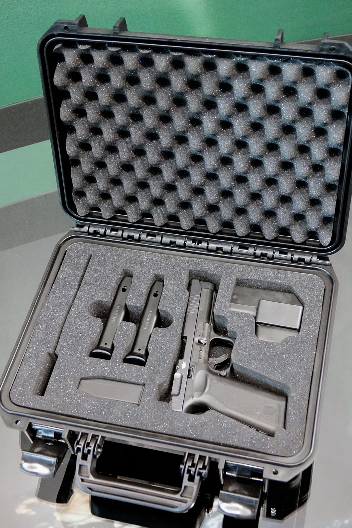 The Czech Small Arms Vz.15 pistol is sold in a foam-padded special case, jointly with two magazines, a magazine loader, a cleaning rod, and a dedicated holster