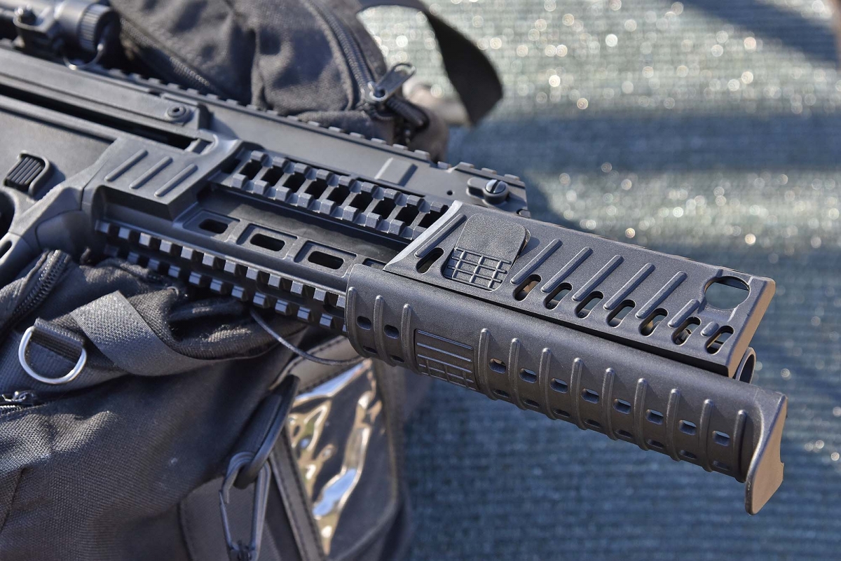 The polymer protective panels can slide out of the handguard to expose all the tactical rails, or even just one or two at the time