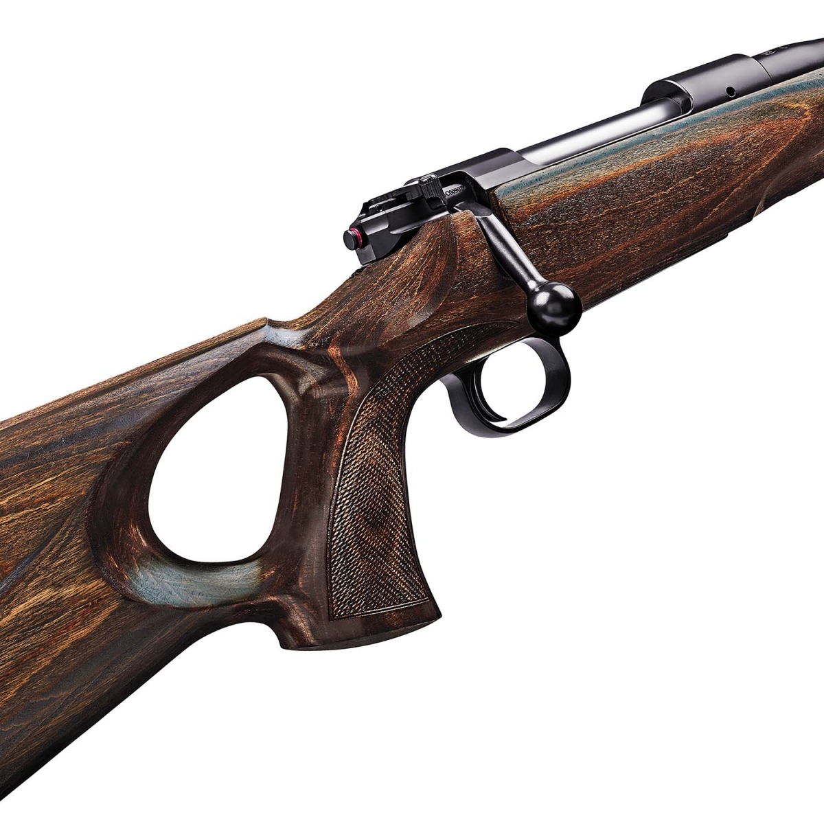 The thumbhole pistol grip design of the stock. The grips is finely checkered, while the large thumbhole allows a fast grip acquisition even with gloves, like in typical winter hunting conditions