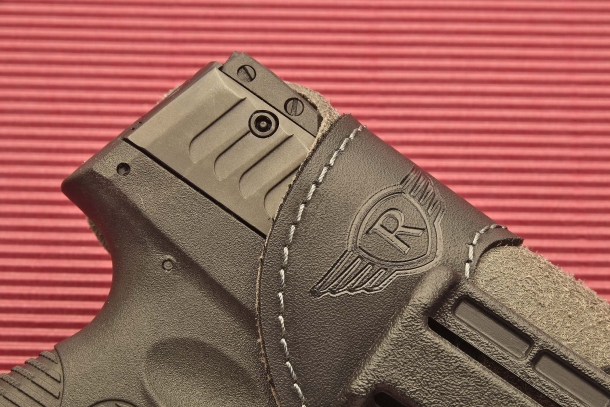 The holster mouth is reinforced with an outer polymer lining