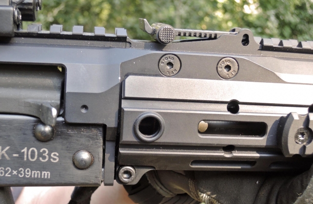 The ACR handguard is held in place by a single screw pin