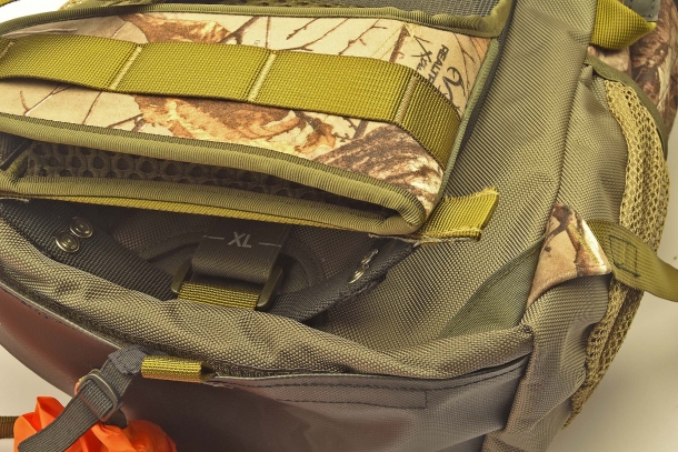 The backpack has a removable, armored carry frame