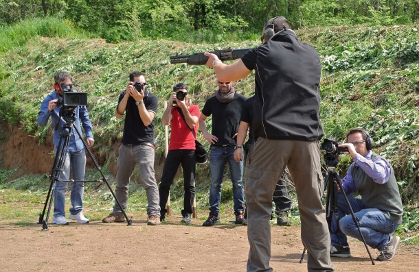 Actors, as well as Directors and any other people directly involved in movie scenes with firearms, should be trained and informed about proper firearms handling and related safety rules (in this image, a "firearms safety" class held by GUNSweek.com to a group of photo/video professionals)