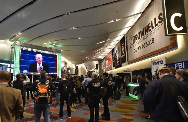Groups of people standing at SHOT Show, during the inaugural ceremony of Donald Trump