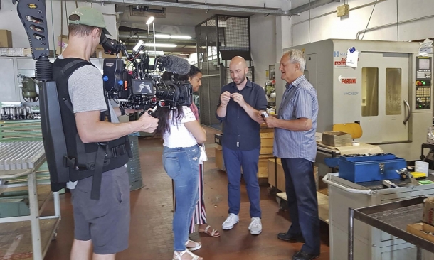 A picture from the backstage: Niccolò Campriani, Gianpiero Pardini and the Olympic Channel staff at the Pardini Armi plant in Lido di Camaiore (Italy)
