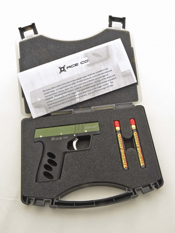 The Ace Co. Micro-Shot as sold in its case, which includes an OC canister and a training cartridge