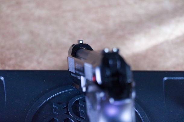 The front sight dot is larger than the rear sight dots and naturally draws attention.