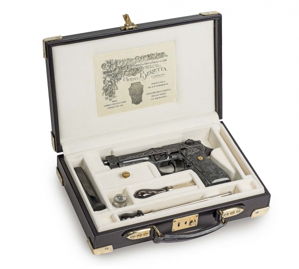 The Beretta 98FS Demon pistol in its case
