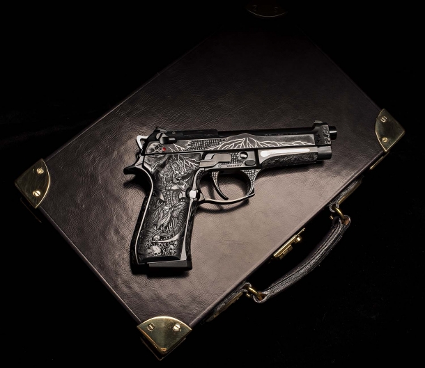 The Beretta 98FS Demon piston on its leather case