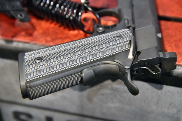 A detail of the VZ Alien grips on the STI H.O.S.T. pistol