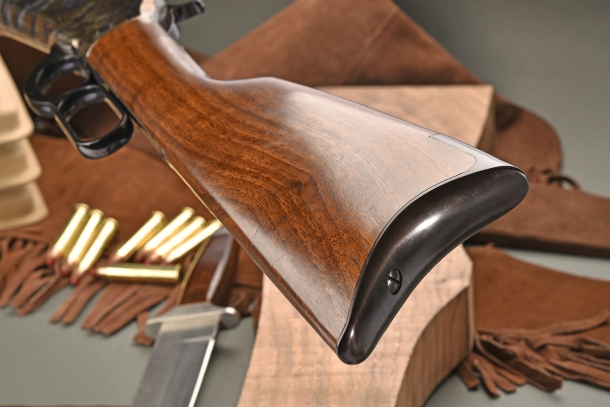 The stock is the traditional Winchester straight one, with a steel butplate