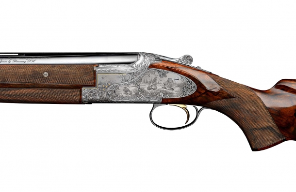 Left plate view of a finely engraved Browning B25 shotgun