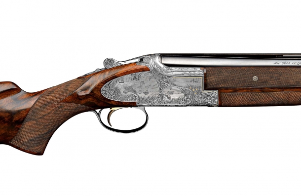 Right plate view of a finely engraved Browning B25 shotgun