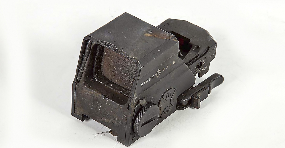 A burned Sightmark Ultra Shot M-Spec reflex sight: nearly
